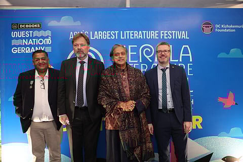 Shashi Tharoor with other delegates including the German Ambassador (second from left) at his official residence 