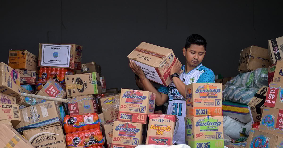 Survivors pick up pieces in flood-hit Indonesia as more rain predicted Survivors pick up pieces in flood-hit Indonesia as more rain predicted