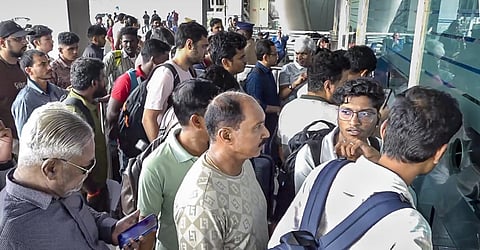 Passengers at an IndiGo airline's counter at the airport, in Chennai, Tamil Nadu. 