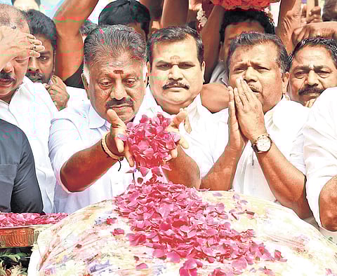 Former chief minister O Panneerselvam paying tribute at Jayalalithaa’s memorial in Chennai on Friday