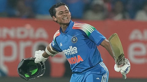 Yashasvi Jaiswal celebrates his century during the third One Day International cricket match between India and South Africa in Visakhapatnam. (Photo | AP)