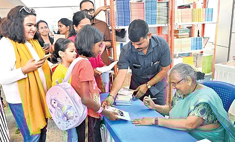 Author and Rajya Sabha member Sudha Murty at a book signing event at the Bangalore Literature Festival on Saturday | Shashidhar Byrappa
