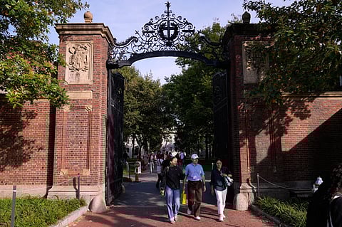 The gates of Harvard Yard at Harvard University, Tuesday, Sept. 30, 2025, in Cambridge, Mass.