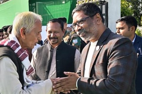 Jharkhand Chief Minister Hemant Soren receives the 'Armed Forces Flag Day' badge from Director of the Directorate of Soldier Welfare in the Jharkhand Legislative Assembly Brigadier Niranjan Kumar (Retd.), in Ranchi.
