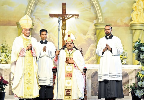 Bishop Antony Kattiparambil takes the ceremonial chair next to Archbishop of Goa and Daman Cardinal Filipe Neri António Sebastião do Rosário Ferrão on Sunday.