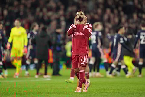 Liverpool's Mohamed Salah applauds after the Champions League opening phase soccer match between Liverpool and PSV in Liverpool