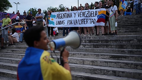 Members of Venezuela's opposition demonstrate ahead of the Nobel Peace Prize ceremony, where Venezuelan Maria Corina Machado is among this year's laureates, in Buenos Aires, Argentina, Saturday, Dec. 6, 2025.
