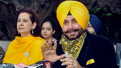 Congress leader Navjot Singh Sidhu, along with his wife, Navjot Kaur Sidhu, addressing a press conference in Amritsar.