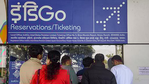 Passengers at an IndiGo Airlines counter at Chhatrapati Shivaji Maharaj International Airport in Mumbai, Sunday, Dec. 7, 2025. 