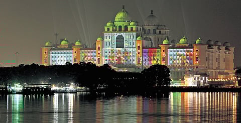 The state Secretariat is lit up with images showcasing women empowerment, on the eve of the Telangana Rising Global Summit, in Hyderabad on Sunday