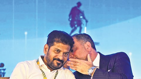 Chief Minister A Revanth Reddy listens to Trump Media and Technology Group Director Eric Swider during the Telangana Rising Global Summit at Future
