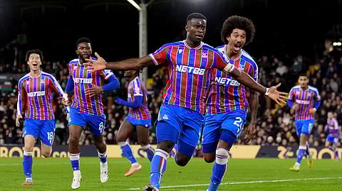 Crystal Palace's Marc Guehi celebrates after scoring his sides second goal during the English Premier League soccer match between Fulham and Crystal Palace, in London, Sunday, Dec. 7, 2025.