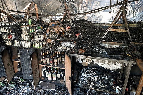 Charred remains of the nightclub after a fire broke out due to a cylinder blast, in North Goa district, Sunday, Dec. 7, 2025.