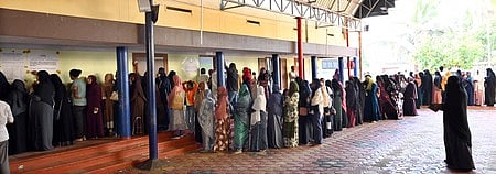 A long queue of women voters waiting to cast their votes in the local body election, at Beema Pally in Thiruvananthapuram on December 9, 2025.