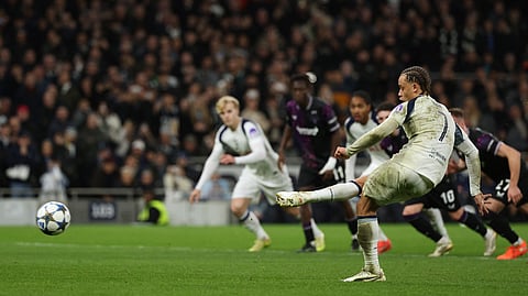 Tottenham Hotspur's Xavi Simons scores their third goal from the penalty spot during the UEFA Champions League football league stage match between Tottenham Hotspur and Slavia Prague on December 9, 2025.