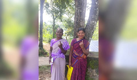 Sarasu (left) and Parappi (right) after voting at the Government Tribal LP School, Puravimala on Wednesday. 