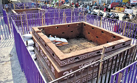 Homa gudam set up for the devotees to drop coconuts filled with ghee during the relinquishment of Bhavani Deeksha at Kanaka Durga temple.