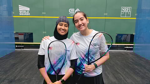 Squash Aifa Azman (L) and Aira Azman