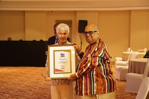 N Ramachandran being feted by World Squash president Zena Wooldridge
