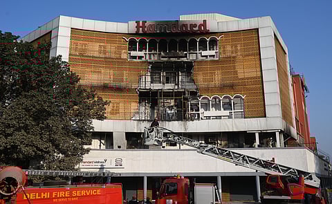 Firefighters dousing a fire that broke out on Wednesday at the Hamdard Building in Turkman Gate, in New Delhi on Wednesday.