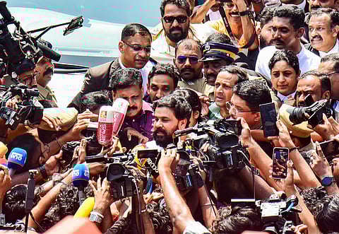 Malayalam actor Dileep leaves the Ernakulam district court following his acquittal in the 2017 sexual assault case involving a south Indian actress, in Kochi, Kerala, Monday, Dec. 8, 2025.