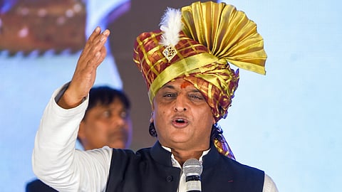 Samajwadi Party President Akhilesh Yadav addresses the gathering during a Yadav community meeting, in Hyderabad, Friday, Dec. 12, 2025