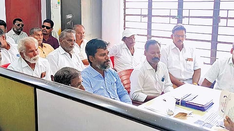 Fisherfolk submitting a petition to assistant director of fisheries on Friday 
