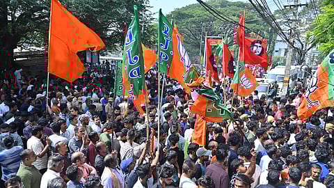Political parties celebrate their wins in front of the Palakkad Municipality headquarters on Saturday.