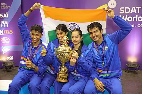 India squash team members with the World Cup trophy