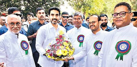 IT Minister Lokesh being welcomed at the Don Bosco School in Mangalagiri.