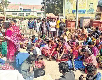 Villagers staging dharna in front of the district collectorate.