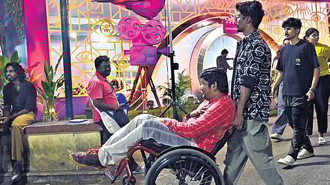 A disabled young man leaving Tagore Theatre in Thiruvananthapuram after attending the 30th IFFK.