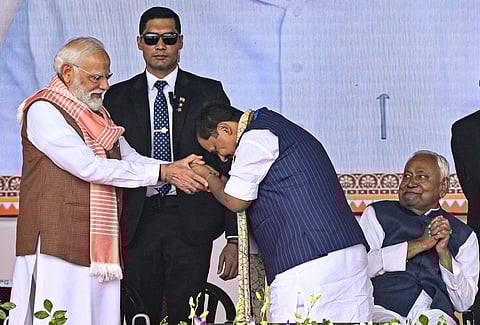 Prime Minister Narendra Modi being greeted by BJP MLA Nitin Nabin.