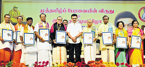 Chief Minister MK Stalin presenting awards to artistes at an event held in Chennai on Monday.