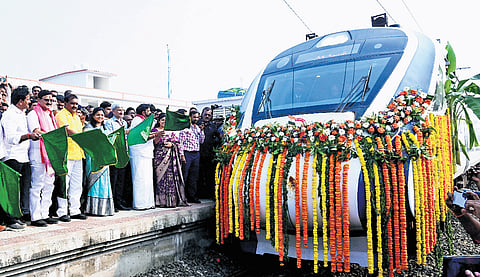 Union Minister Bhupatiraju Srinivas Varma flagging off Vande Bharat at Narasapuram railway station in West Godavari on Monday 