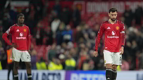 Manchester United's Bruno Fernandes walks off the pitch after a Premier League soccer match between Manchester United and Bournemouth in Manchester, England, Monday, Dec. 15, 2025.