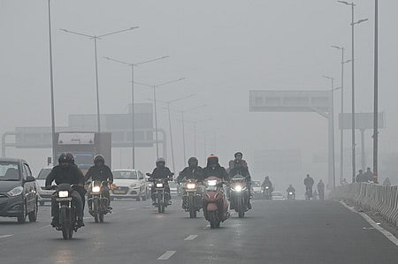 Image of Vehicles plying Delhi road. 