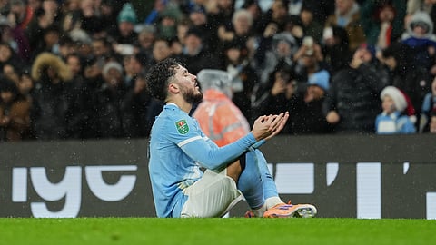 Manchester City's Rayan Cherki celebrates after scoring his side's first goal during the English League Cup soccer match between Manchester City and Brentford in Manchester, England, Wednesday, Dec. 17, 2025.