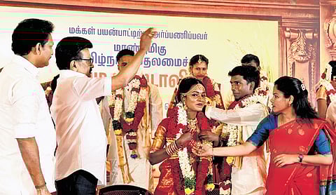 CM MK Stalin presiding over the wedding ceremony after inaugurating the Perarignar Anna Marriage Hall.