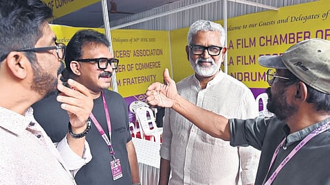 Film director and screenplay writer Blessy with film producer Sandip Senan at Tagore Theatre, the main venue of the 30th IFFK in Thiruvananthapuram on Wednesday.
