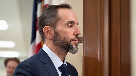 Former Department of Justice Special Counsel Jack Smith enters a room in the Rayburn House Office Building to give his deposition before the House Judiciary Committee.