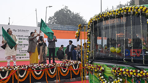 Delhi Chief Minister Rekha Gupta with Transport Minister of Delhi Pankaj Kumar Singh seen during flagging off ceremony of New Em-Buses at Kashmiri Gate in New Delhi on Thursday.
