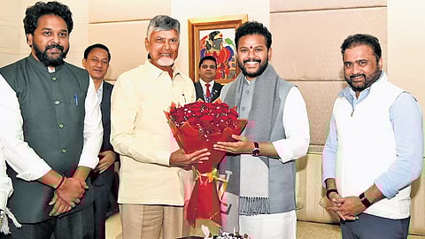CM N Chandrababu Naidu welcomed by Civil Aviation Minister K Rammohan Naidu, and other coalition MPs in New Delhi on Thursday night. Later, the AP CM greeted Rammohan Naidu who cut the cake on the occasion of his birthday I Express