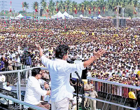 TVK president Vijay addressing a public meeting at Vijayamangalam in Erode district.