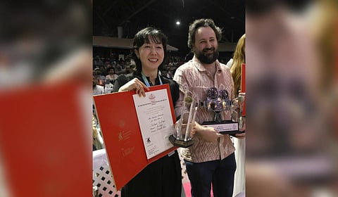 Keiko Okawa, editor of ‘Two Seasons, Two Strangers’, which won the Suvarna Chakoram for Best Film at the 30th IFFK and Saumyananda Sahi, who won the Rajata Chakoram for Best Debut Director, at the closing ceremony at Nishagandhi auditorium in Thiruvanathapuram on Friday