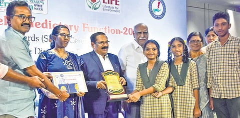 Chief Secretary K Vijayanand presents awards to winners of competitions organised to mark the National Energy Conservation Week, in Vijayawada.