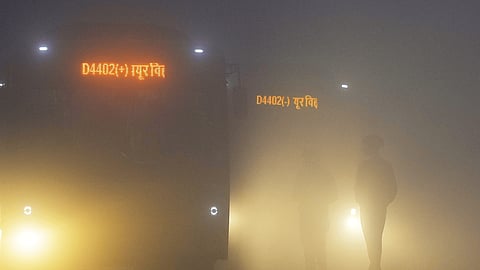 Visibility plunged across parts of Delhi amid dense fog and worsening air quality on Saturday morning, Dec. 20, 2025. 
