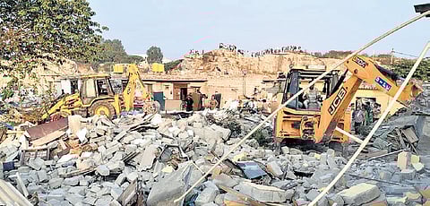 Bengaluru Solid Waste Management Limited (BSWML) officials, along with police and marshals used JCB machines to pull down the homes.