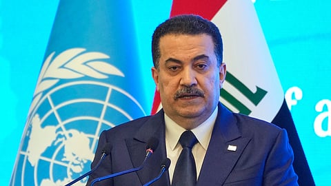 Iraq's Prime Minister Mohammed Shia al-Sudani speaks during an event to mark the end of the UN political mission in Baghdad, Iraq, Saturday, Dec. 13, 2025.