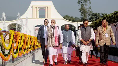 Prime Minister Narendra Modi, with Assam Governor Lakshman Prasad Acharya, Chief Minister Himanta Biswa Sarma, and Union Minister Sarbananda Sonowal, arrives at Swahid Smarak Kshetra at Paschim Boragaon to pay tribute, in Guwahati on Sunday. 